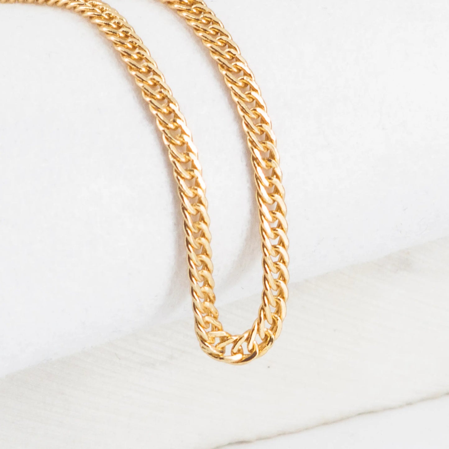 CADENA CUBANA CONTINUA 2MM-60CM - Oro laminado 18k